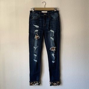 KanCan Ripped Skinny Jean With Leopard Cuffed Hem and Patches